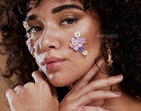 Beauty, flowers and makeup, portrait of black woman from Brazil with beautiful face on studio backg - Stock Photo - Images