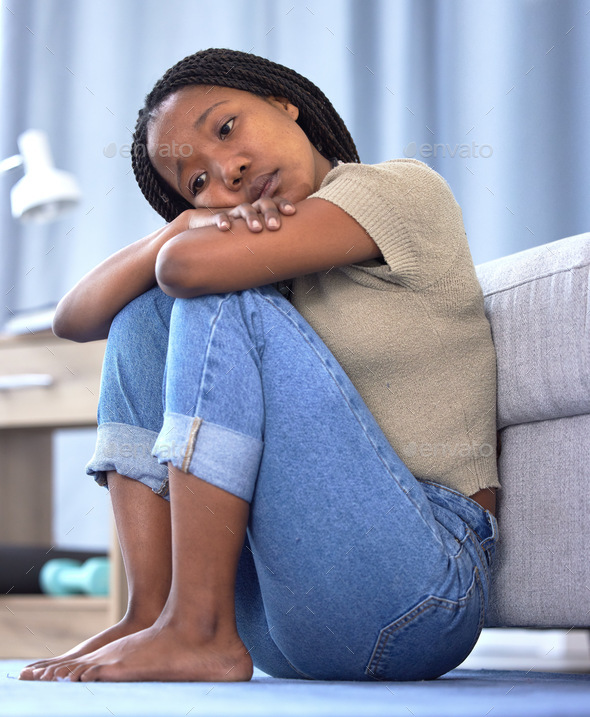 Black woman, sad or depression in house, home or mental health problem for sad news, grief or loss.