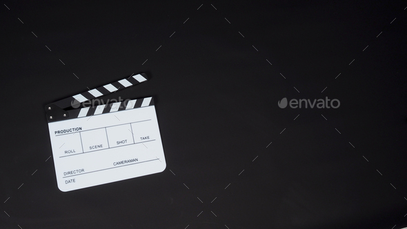 White Clapperboard or movie slate on black background.