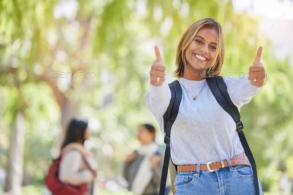 Young woman, thumbs up and university student, yes and success in education, academic study and to
