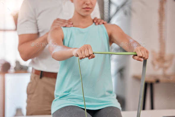 Hands, physiotherapy and rehabilitation with a woman stretching a resistance band in a session at a