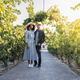 happy young interracial couple on holiday in a vineyard - PhotoDune Item for Sale