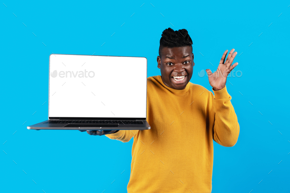 Great Website. Surprised Black Man Holding Laptop Computer With Blank White Screen