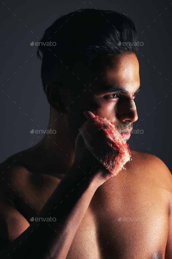 Fight, boxing and man with fist injury after training against black studio background. Violence, fi