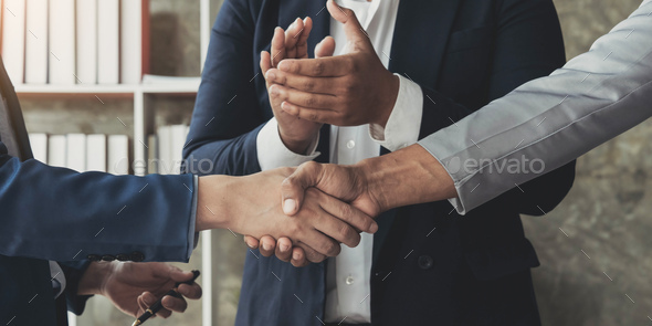 Business handshake for teamwork of business merger and acquisition,successful negotiate,hand shake,t