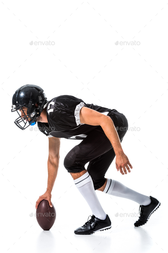 side view of American Football player with ball Isolated On White Stock ...