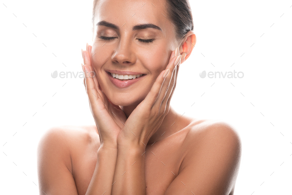 Excited Naked Babe Woman Touching Face With Hands And Laughing Isolated On White Stock Photo By