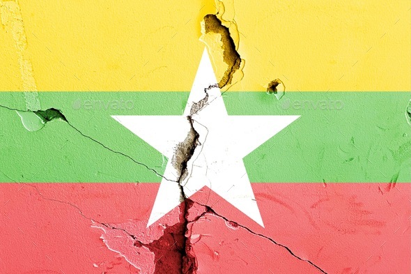 National flag of Myanmar painted on a weathered broken wall - political conflict concept