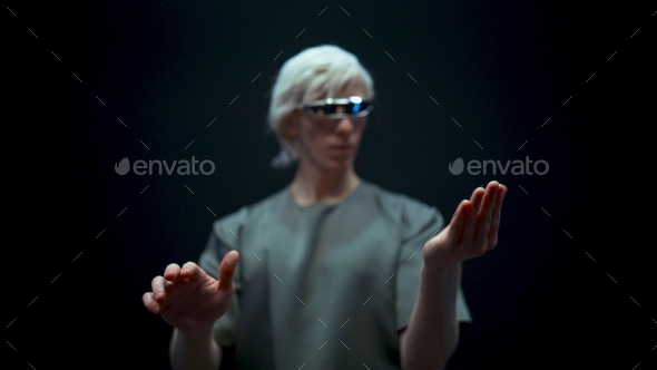 Man touching interactive interface augmented reality. Specialist wearing headset