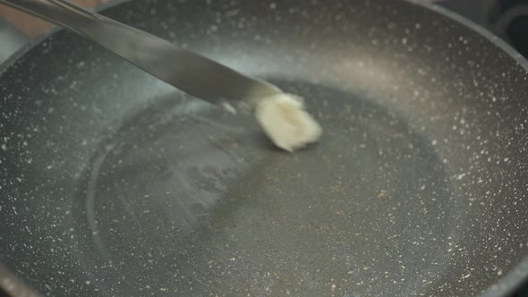 Fresh Eggs Break in Hot Frying Pan on Stove