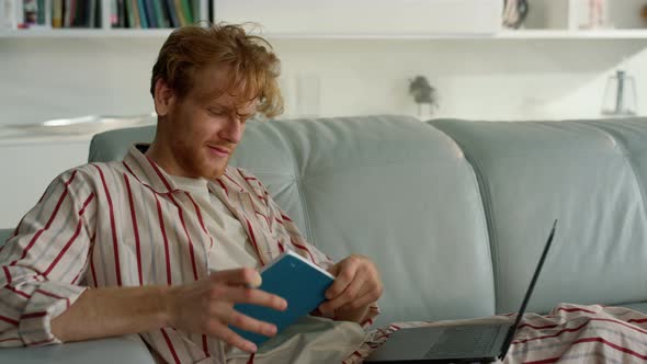 Smiling Guy Elearning Home on Weekend Closeup alt