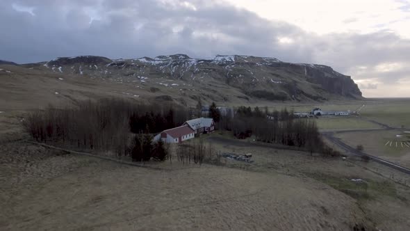 Aerial view of houses and farm in the countryside in Iceland