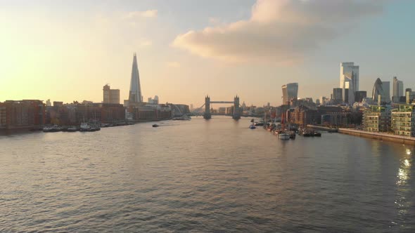 rising drone shot London Thames river city centre sunset alt