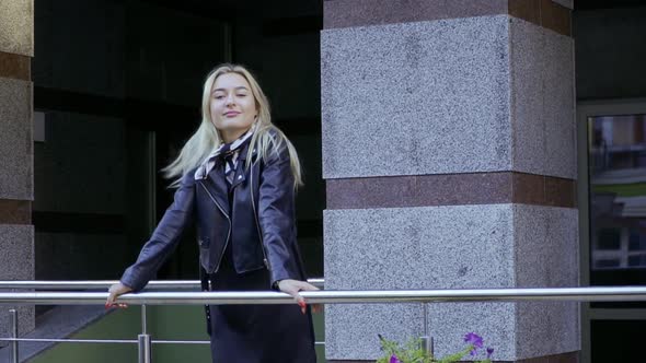 Beautiful Girl Walking the City Street alt