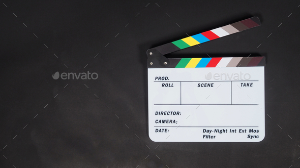 Clapperboard or clap board on black background.