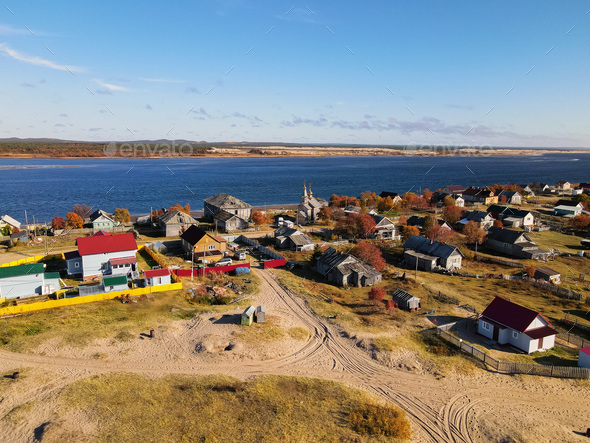 Top view of the village with wooden houses. Stock Photo by Yakov_Oskanov