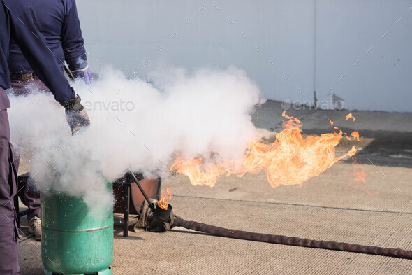 The instructor demonstrate and training the fire extinguisher use, fire evacuation and fire fighting