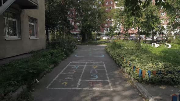 Drone view of children's drawings on the asphalt 23 alt
