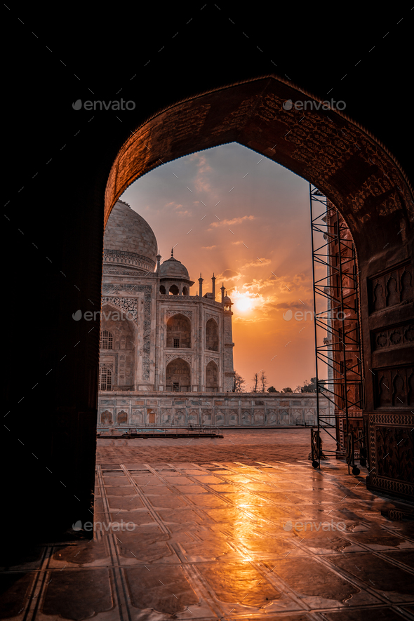 Vertical Of A Scenic View Of The Taj Mahal Mausoleum At Sunset Through ...