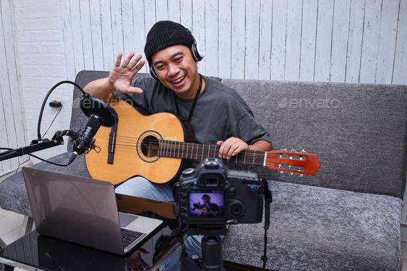 Music vlogger say hi to his online viewers