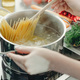 Girl cooking pasta spaghetti in pot - PhotoDune Item for Sale