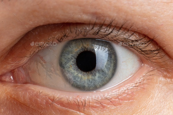 human pupil of blue color close up