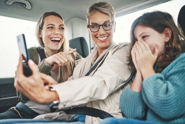 Phone, road trip or travel with a family selfie of a girl, mother and grandmother in a car for a ho - Stock Photo - Images