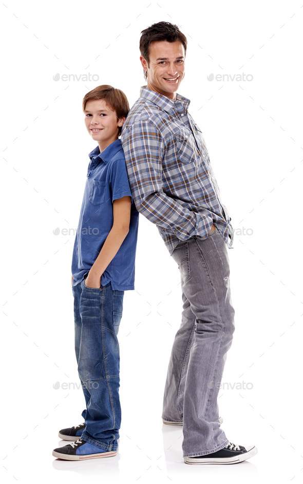 Theyre two cool guys. A father and son standing back to back against a white background.