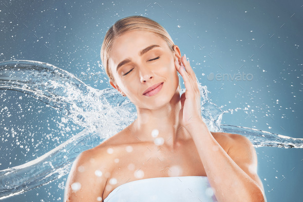 Water splash, woman and beauty on blue background of skincare, aesthetic wellness or clean body car