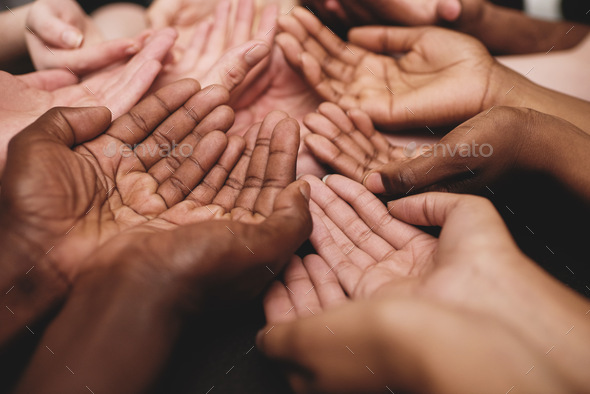 Show your support towards a good cause. Cropped shot of a group of hands held cupped out together.