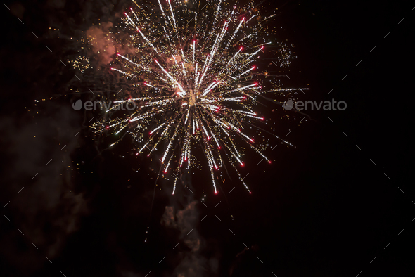 firework explosion from beautiful stars, splashes, sparks and bright lines of lights