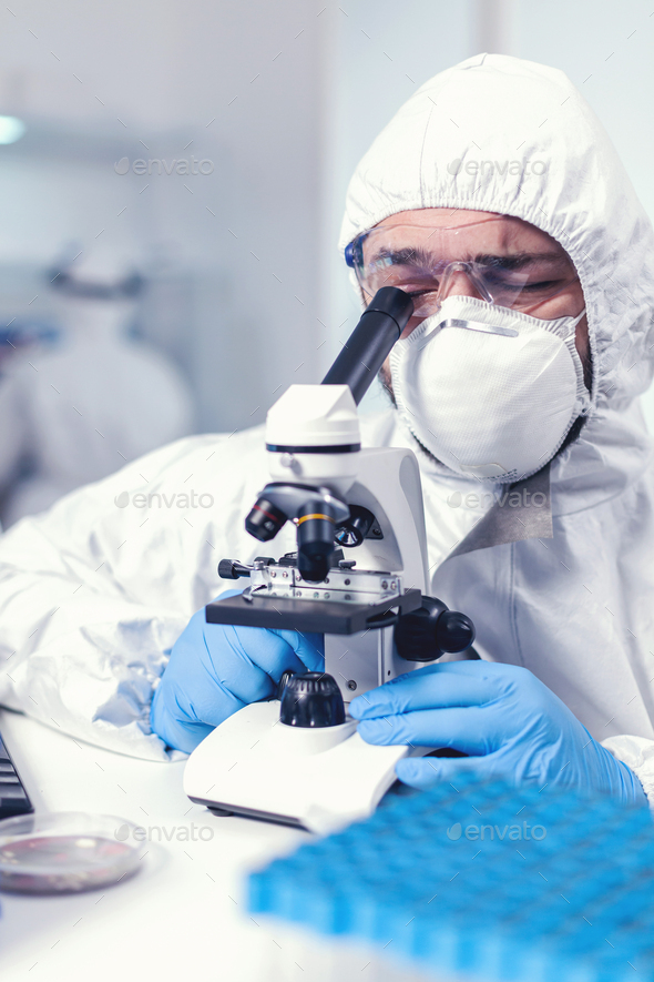 Close up of medical engineer doing research on covid virus