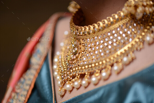 Macro shot of a golden bridal wear necklace