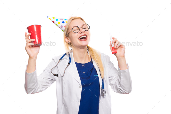 Woman doctor in white coat with party stuff
