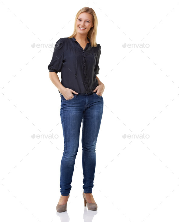 Confident pose. Full length studio shot of a young woman with her hands in  her pockets. Stock Photo by YuriArcursPeopleimages