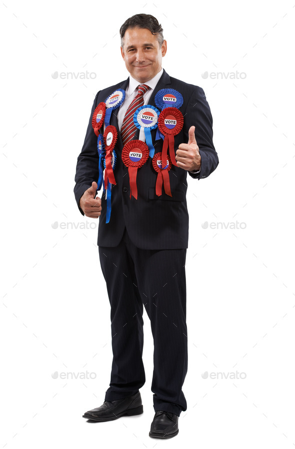 Portrait of a friendly looking politician wearing voting ribbons and giving you the thumbs up