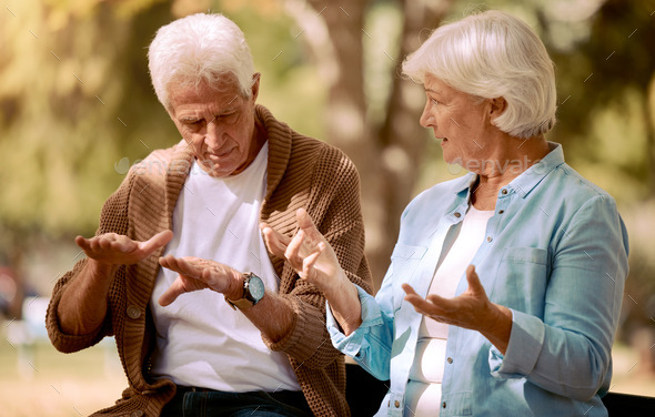 Senior couple, love and hands in sign language communication in nature, public park or garden. Reti