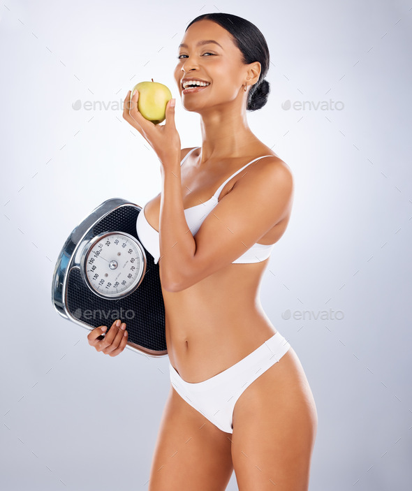Woman, lingerie or body and diet apple, weight loss scale or healthy food for fat management, train