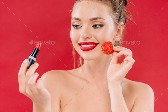 Naked Beautiful Woman With Red Lips Holding Lipstick And Strawberry