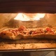 Making homemade pizza in the pizza oven - PhotoDune Item for Sale