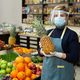 Portrait of a grocery store worker in a protective mask and gloves - PhotoDune Item for Sale