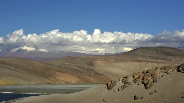 Time lapse of clouds moving over dunes in the Atacama Desert, South America alt