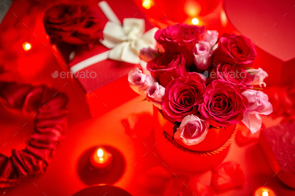 Valentines day romantic decoration with roses, boxed gifts, candles - Stock Photo - Images