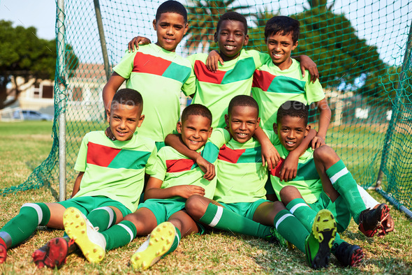 Meet the soccer stars. Portrait of a boys soccer team on a sports field.