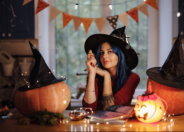 All hallows eve. woman in witch costume - Stock Photo - Images