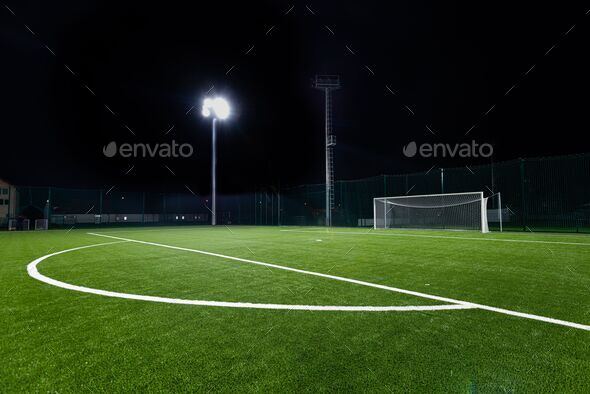 football field at night photography