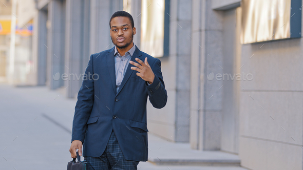 Confident African American serious man employee entrepreneur businessman ethnic male guy worker - Stock Photo - Images