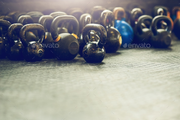Lift to get fit. Shot of weights in a gym.