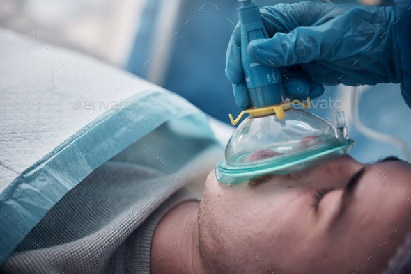 Anesthesia, oxygen mask and medical with man in surgery for breathing, ventilation and operation. H