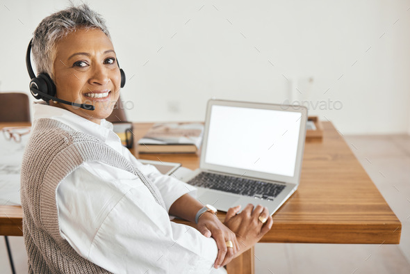 Mature business woman, laptop or call center headset in home office,  telemarketing company or b2b s Stock Photo by YuriArcursPeopleimages